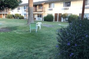 Picture of 99 Palms Inn & Suites