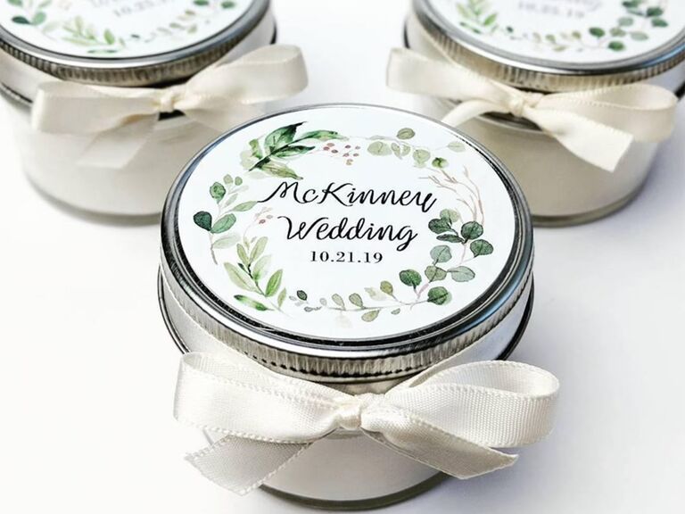 Mason jar top with custom couple name and greenery details