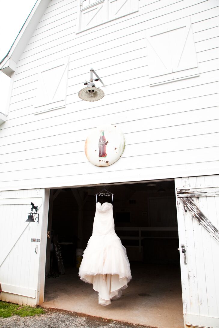 "My dress was totally not what I had invisioned wearing on my wedding day, but once I tried it on, I knew it was the perfect dress for me," says Lindsey. "My champagned colored dress was a fit and flare with a sweetheart neckline and lace up back."