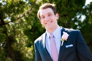Groom Dressed in Navy Suit with Rose Boutonniere
