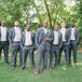 The groomsmen wore gray Vera Wang tuxes with gold ties, pocket squares and cufflinks.