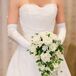 Jennifer carried a cascading bouquet of white roses and ivy.
