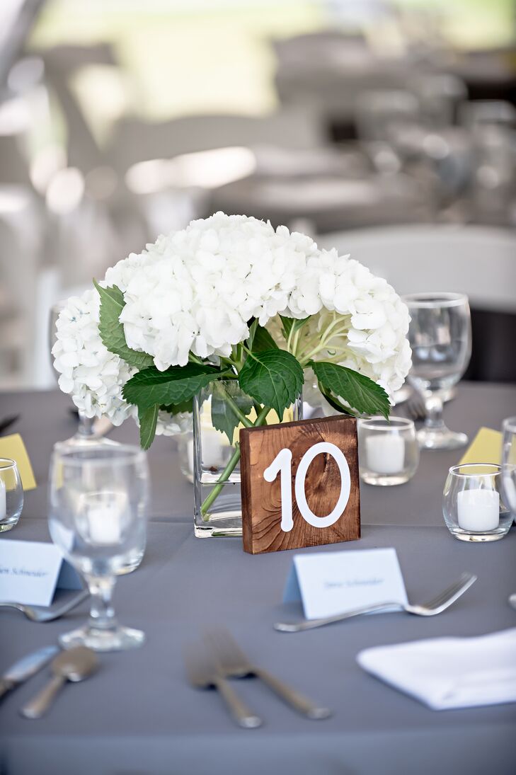 White Hydrangea Centerpieces with Wood Table Numbers