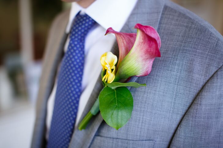 Rob wore a vibrant boutonniere full of colorful green, yellow and pink flowers with a large calla lily as the focal point.