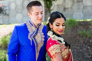 Bride in Red Sari and Groom Cobalt-Blue Sherwani