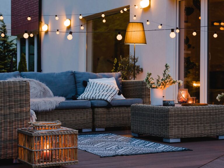 Outdoor wedding registry checklist items on display in backyard patio