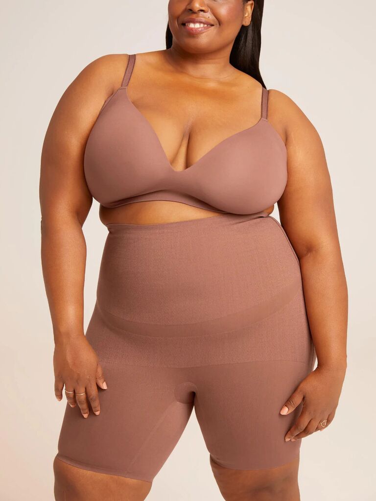 Model wearing nude wedding shapewear shorts and matching bra