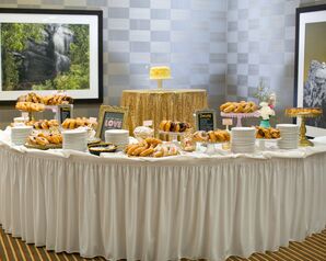 Doughnut and Dessert Bar With Colorful Tiers