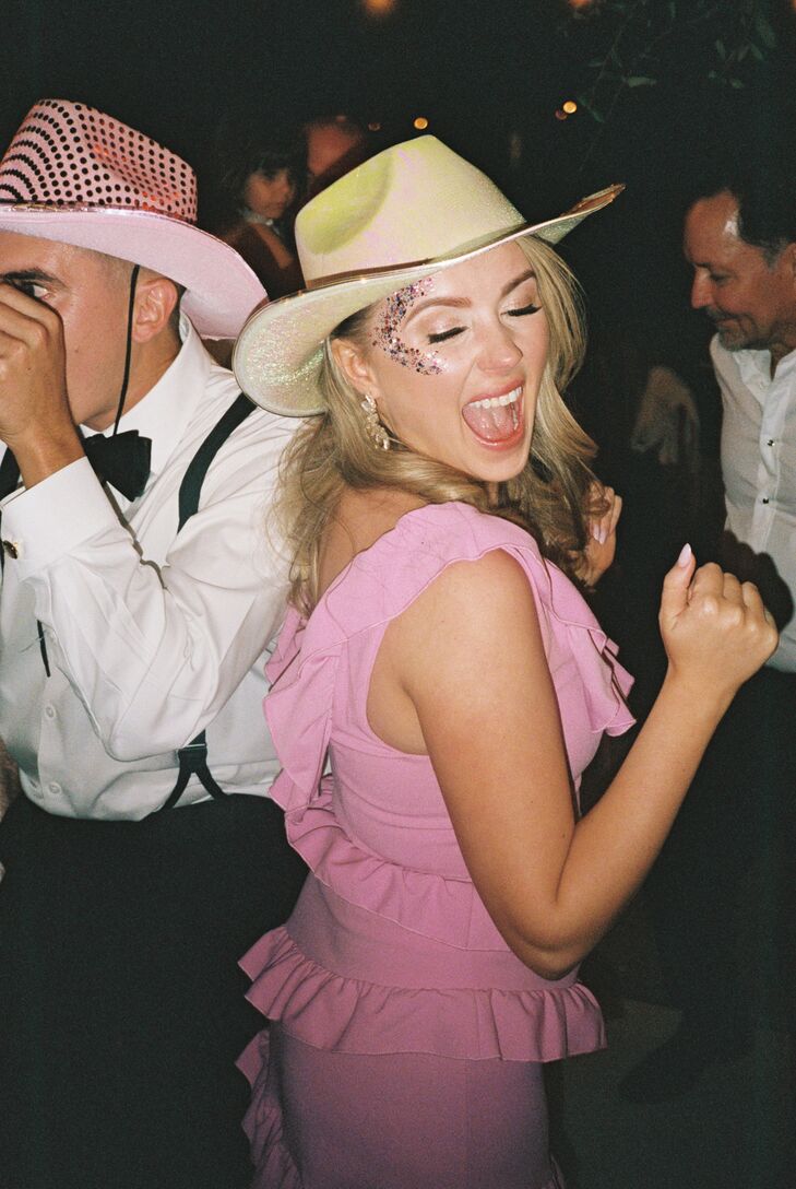 Bridesmaids With Face Glitter and Cowboy Hat Dancing