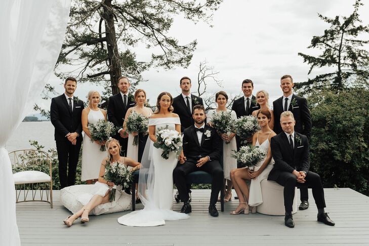 Elegant Wedding Party with Black Tuxedos and White Gowns