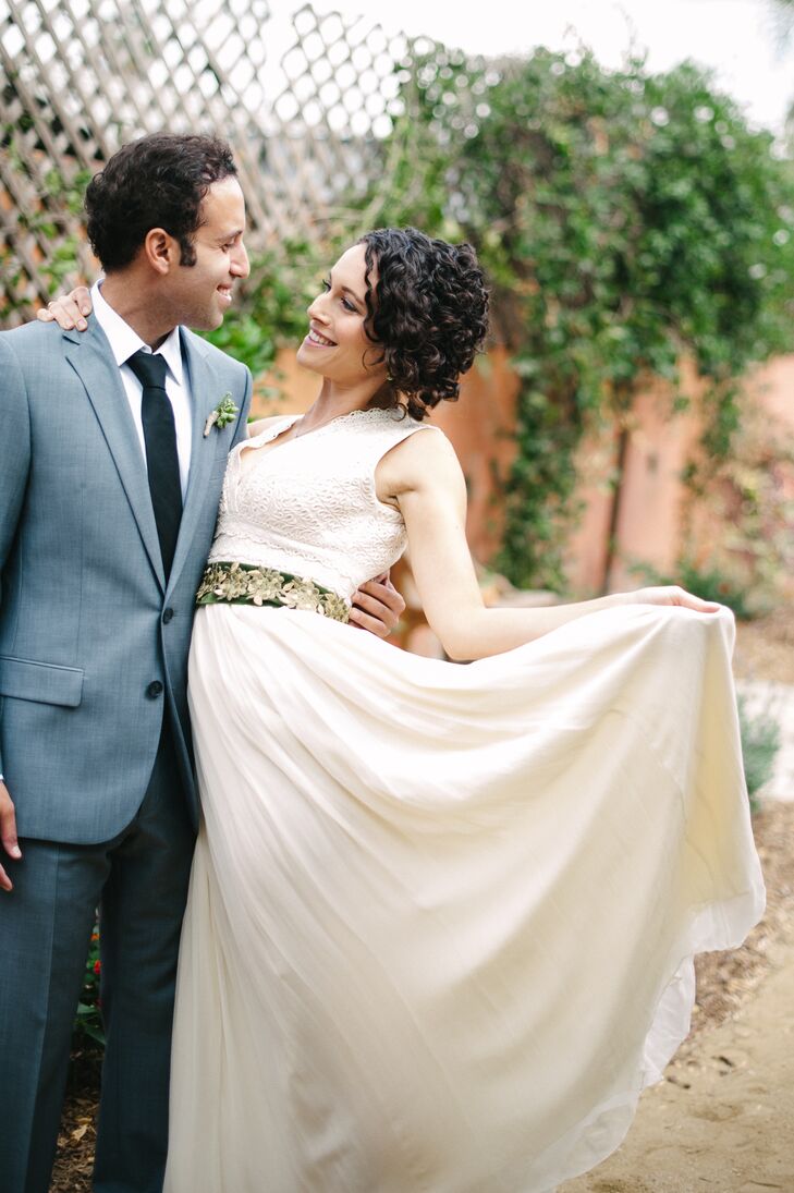 With a newly purchased home and a landscaping project on their hands, this couple decided to hold a wedding in their own backyard, so it could be tran