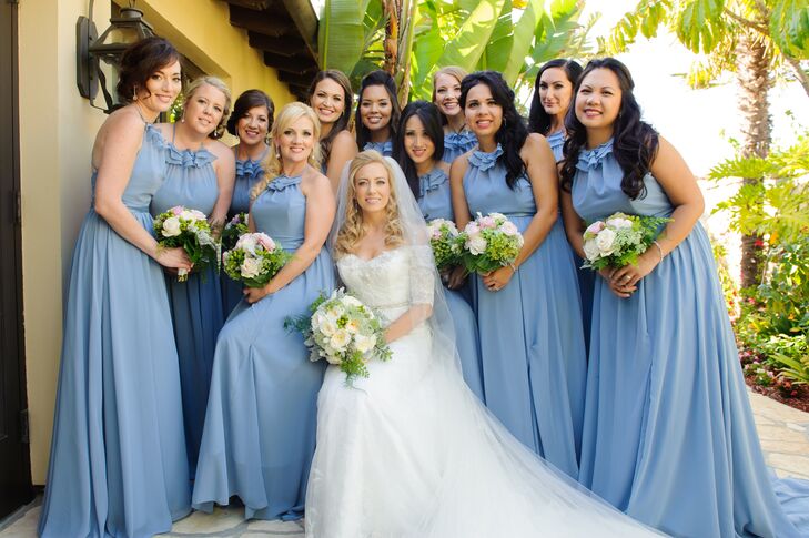 "Jill wanted her best friends to feel beautiful and romantic," the couple says. "With sparkly shoes and crystal earrings, they each looked like a vision of Cinderella. Jill’s matrons of honor, her sister-in-law and best friend, wore sparkly belts to set them apart."