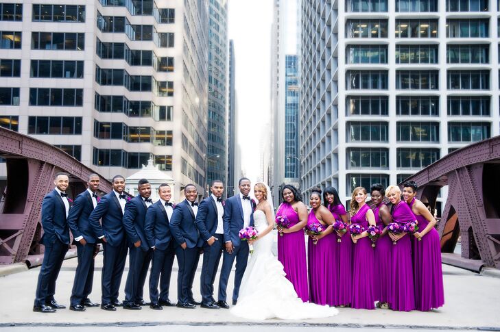 Felicia's favorite flower was the inspiration behind the fuchsia bridesmaid dresses, which were perfectly paired with navy tuxedos.