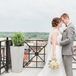 Amber and Adam were married atop SkyDeck, a rooftop bar in downtown Kalamazoo, Michigan. The space offered spectacular views of the city to their guests.