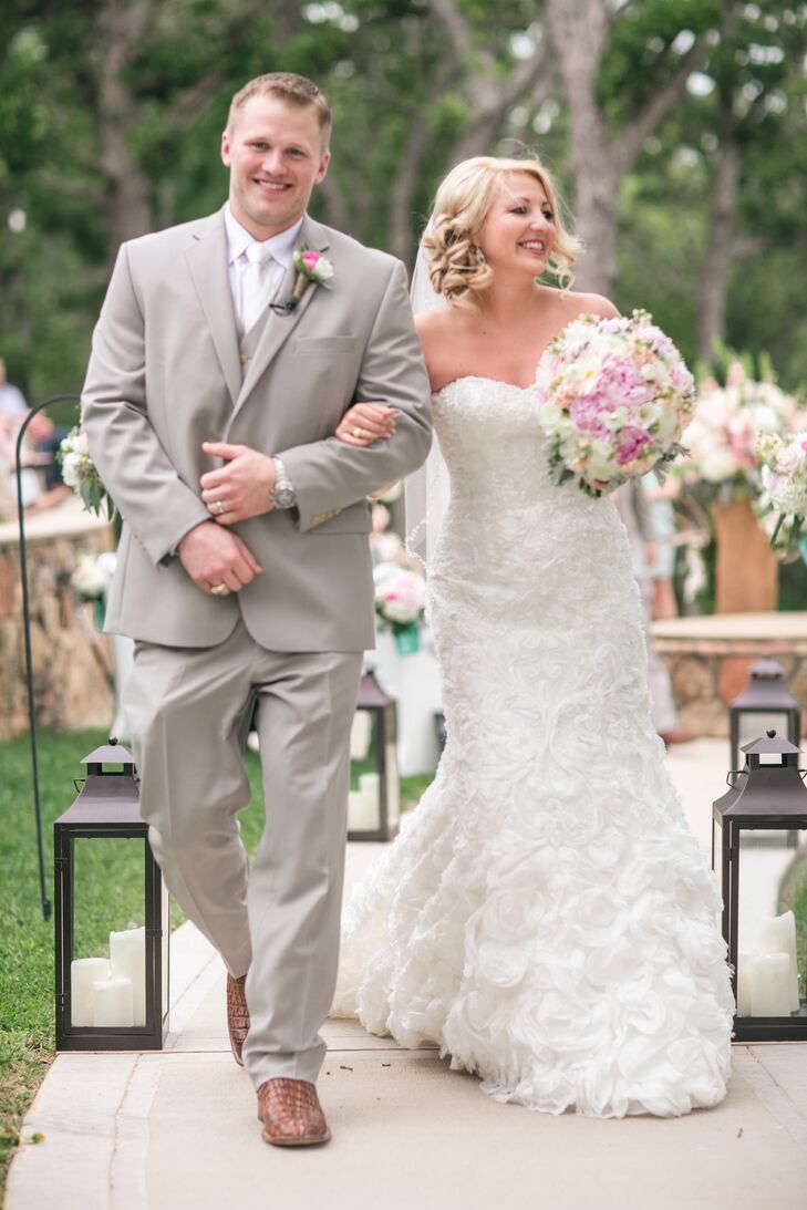 For their wedding, Milly and Stephen played up the country vibe of their ranch locale with organic elements like wood accents and rustic, vintage prop