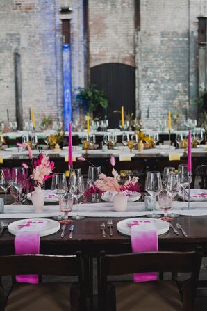 Long Tables With Color Themes on Each, Pink, Yellow, Green in Industrial Space