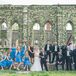 Blue Bridesmaid Dresses and Black Groomsmen Tuxedos