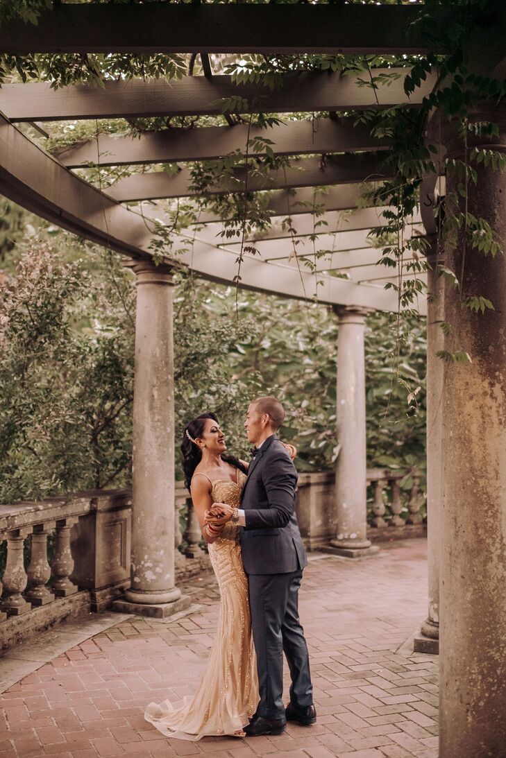 Glamorous Couple with Neutral-Colored Beaded Dress and Gray Suit