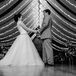 As Anna and Brandon danced around the ballroom, Anna's ball gown designed by Elegance by Roya Couture flowed with their movements. Beaded lace covered the bodice, stopping at the thin silver belt accented with gemstones.