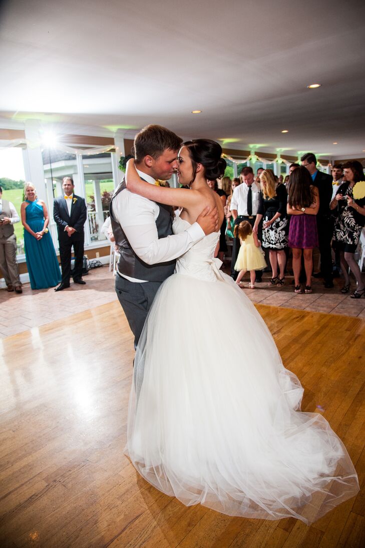 Haley and Jeremiah shared their first dance on the wooden floor inside the Morningside Inn in Frederick, Maryland, where Haley's elegant tulle skirt with a ball gown style flowed with every movement.