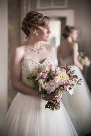 Bride with Intricate Hairstyle and Wedding Jewelry