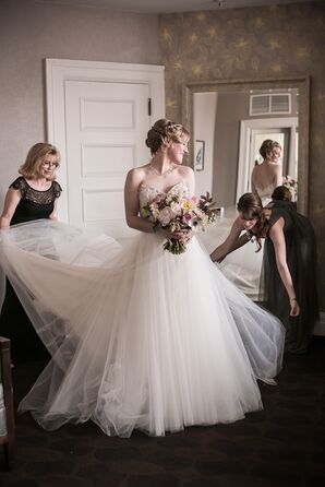 Bride Getting Ready with Mother of the Bride and Bridesmaid