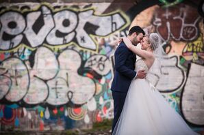 Newlyweds in Front of Philadelphia Graffiti