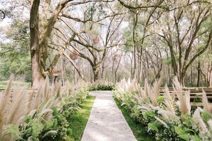 Backyard Ceremony Site with Pampas Grass Aisle Decorations