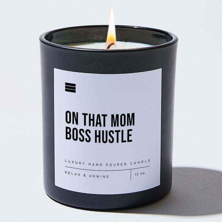 Funny candle that reads "On That Mom Boss Hustle" by Coffee & Motivation. 