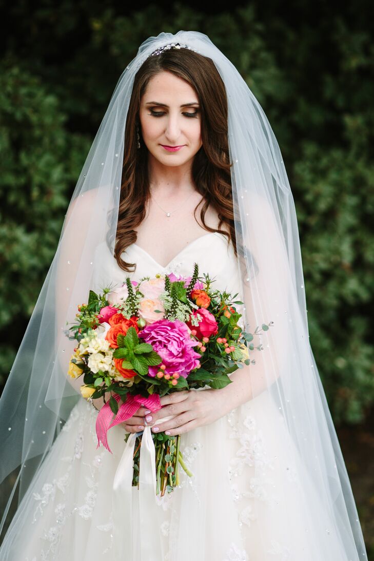 Brightly colored blooms were key for Amanda's bouquet, which was crafted by local florist Kathy Buffandeau.