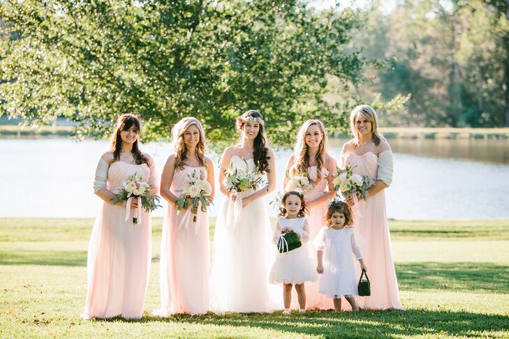 The bridesmaids wore simple long chiffon dresses for the outdoor ceremony.