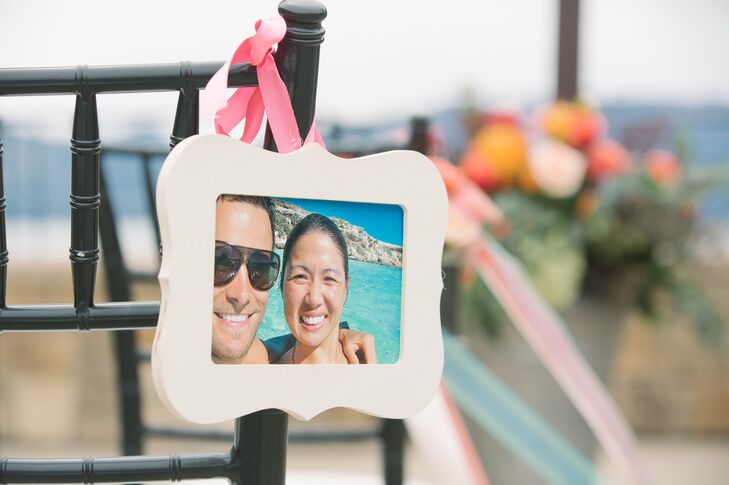At alternating aisles, the couple hung photos taken throughout their relationship.