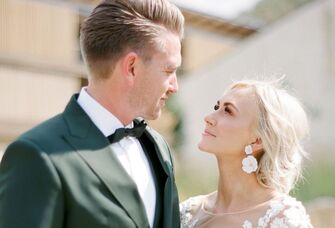 Bride and groom looking at each other during wedding portraits