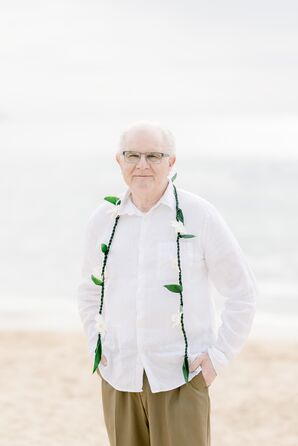 Casual Groom on the Beach With a Lei at His 50th Wedding Anniversary Vow Renewal