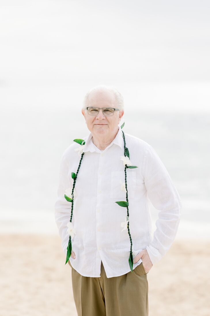 Casual Groom on the Beach With a Lei at His 50th Wedding Anniversary Vow Renewal
