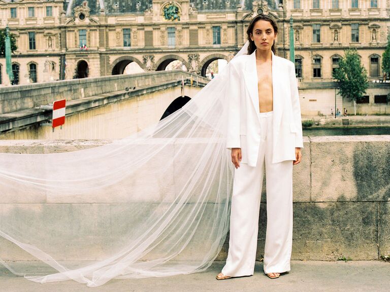 Model wears a bridal look by Donatelle Godart. 