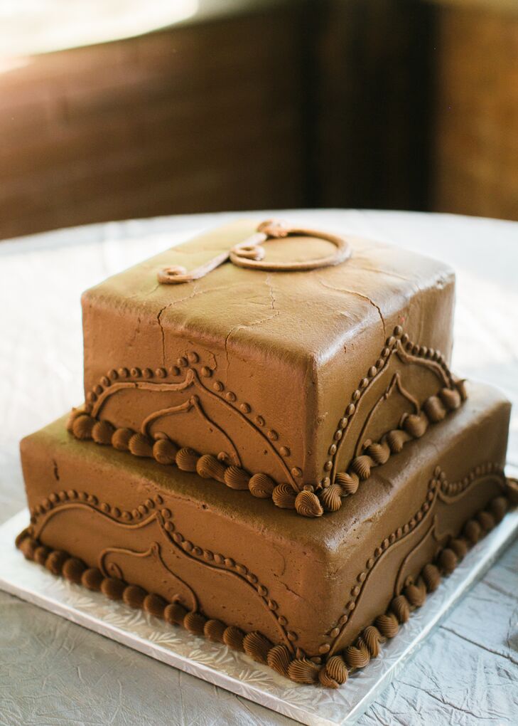 A red velvet cake frosted with chocolate icing was a special request by Derik, and it was appropriately decorated with a "P" for Pearson.