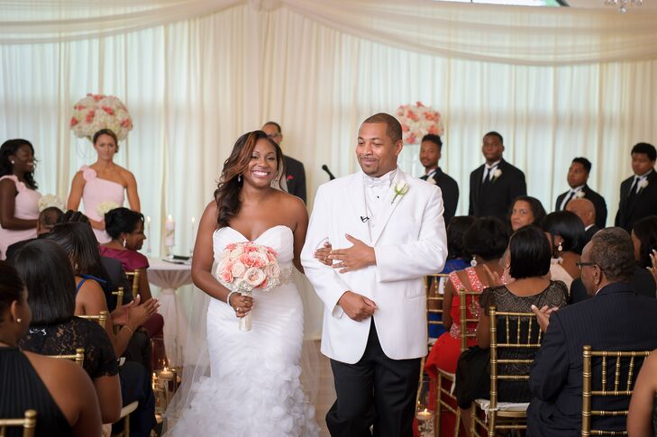 Chantel walked down the aisle in a white mermaid Lillian West wedding dress, which she found at Bel Fiore Bridal in Georgia. She paired the dress with silver Badgley Mischka wedding shoes. Q complemented her with a Black and White tuxedo.