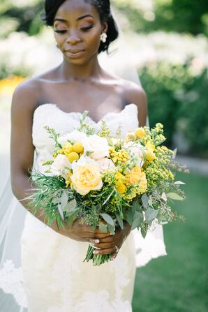 Bride Holding Yellow Bouquet for Wedding at Mystical Rose Gardens in Baldwin, Wisconsin