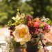 Rose and Peony Centerpieces in Stone Urns