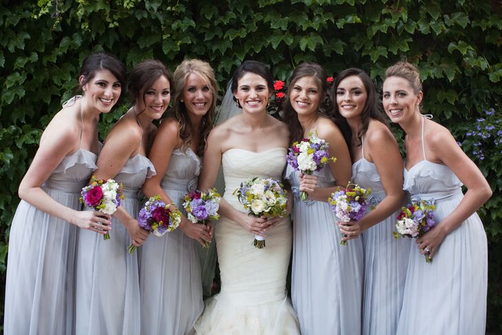 Audrey admits that she was always made fun of for her neutral color choices. However, she made sure her wedding was a true reflection of her and made gray the prominent color throughout the day. The bridesmaids wore floor-length gray dresses.