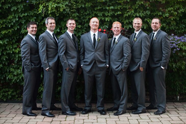 Keeping with the gray look of the outdoor wedding, groomsmen wore charcoal gray suits. "Black tuxedos seemed too formal for an outside wedding," Audrey says.