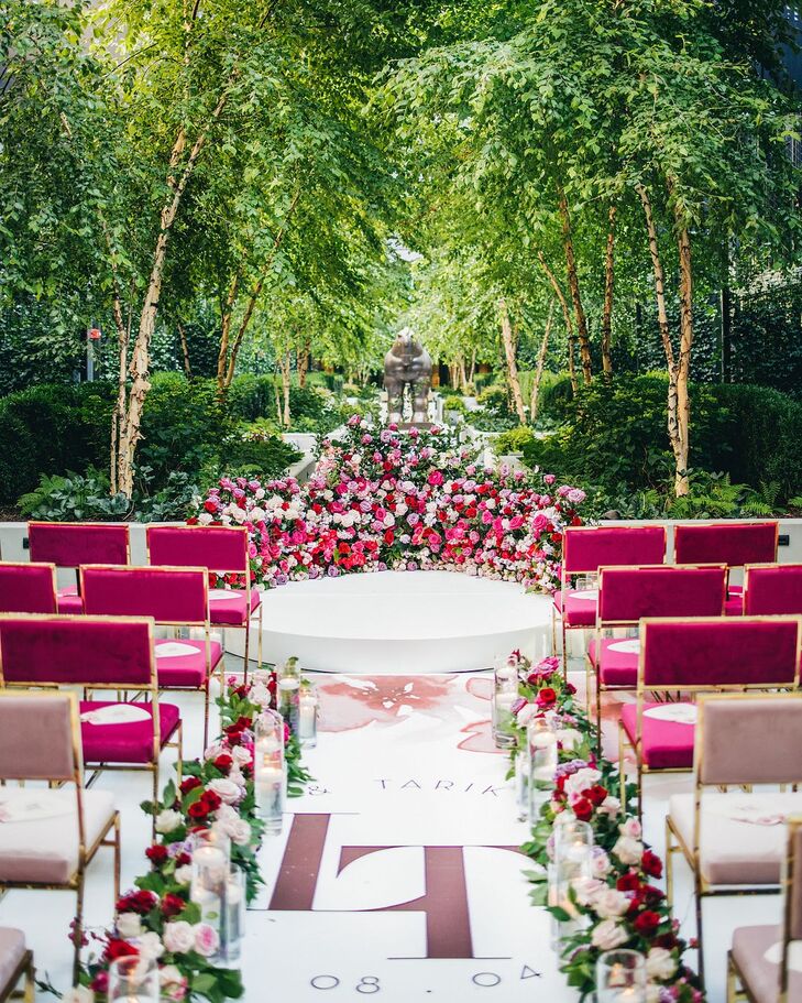 Ceremony With Pink Velvet Chairs and Custom Aisle Design