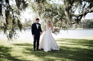 Bride and Groom Stroll Through Estate