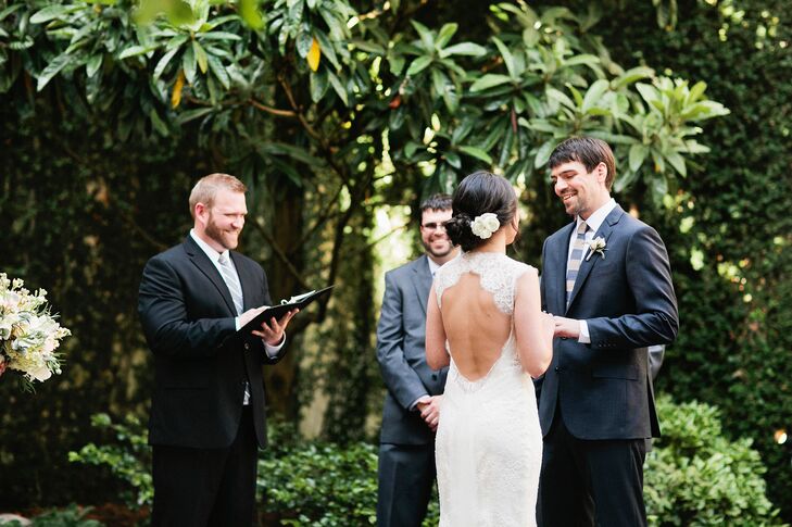 Nicole wore a Monique Lhuillier Chantilly lace V-neck sheath gown with a signature open back and custom alterations. She completed her look with a custom Vera Wang sash and ivory Badgley Mischka heels.