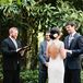 Nicole wore a Monique Lhuillier Chantilly lace V-neck sheath gown with a signature open back and custom alterations. She completed her look with a custom Vera Wang sash and ivory Badgley Mischka heels.