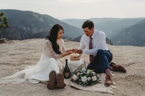 Couple Cutting Cake During Elopement at Glacier Point in Yosemite National Park