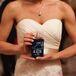 The bride's sister made wedding koozies for guests to take home that incorporated the bride's hometown in Virginia, the groom's upbringing in Maryland and Washington, D.C. for bringing the couple together.