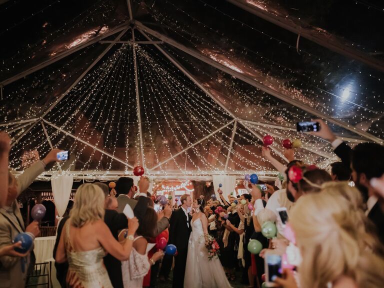 Guests shake maracas for the wedding exit. 