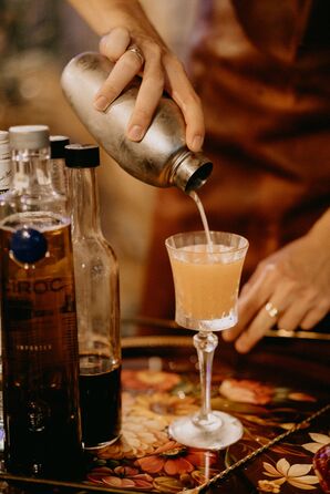 Mixologist Pouring Wedding Signature Cocktail